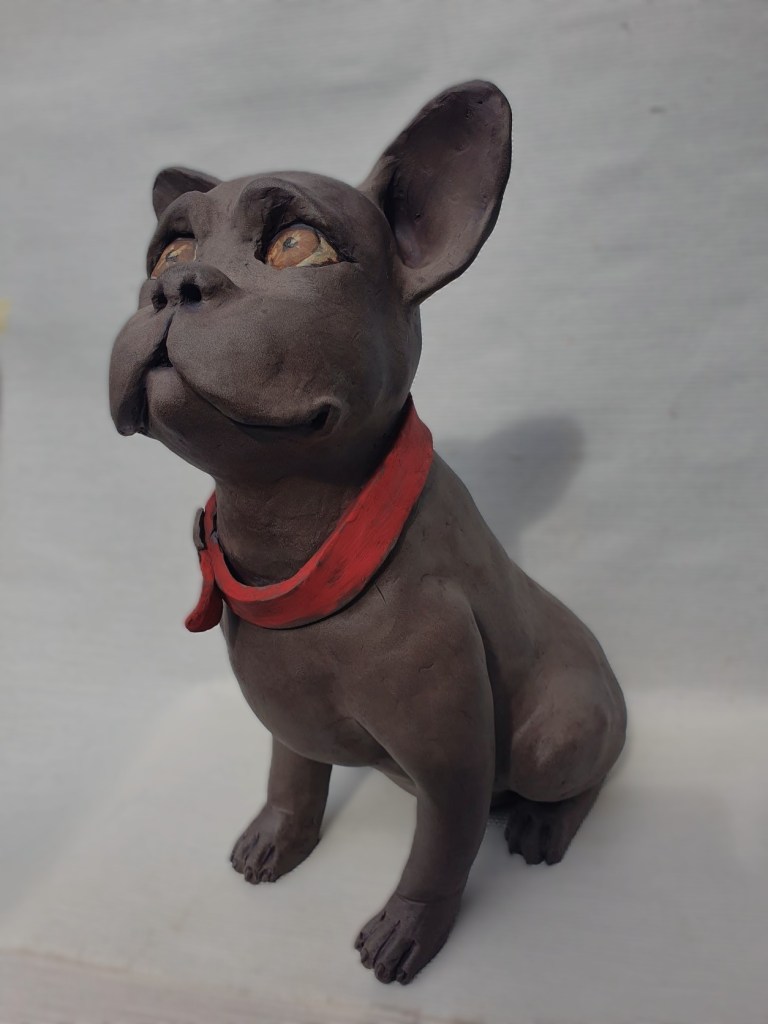 Hond uit donkere klei, Keramikaatje